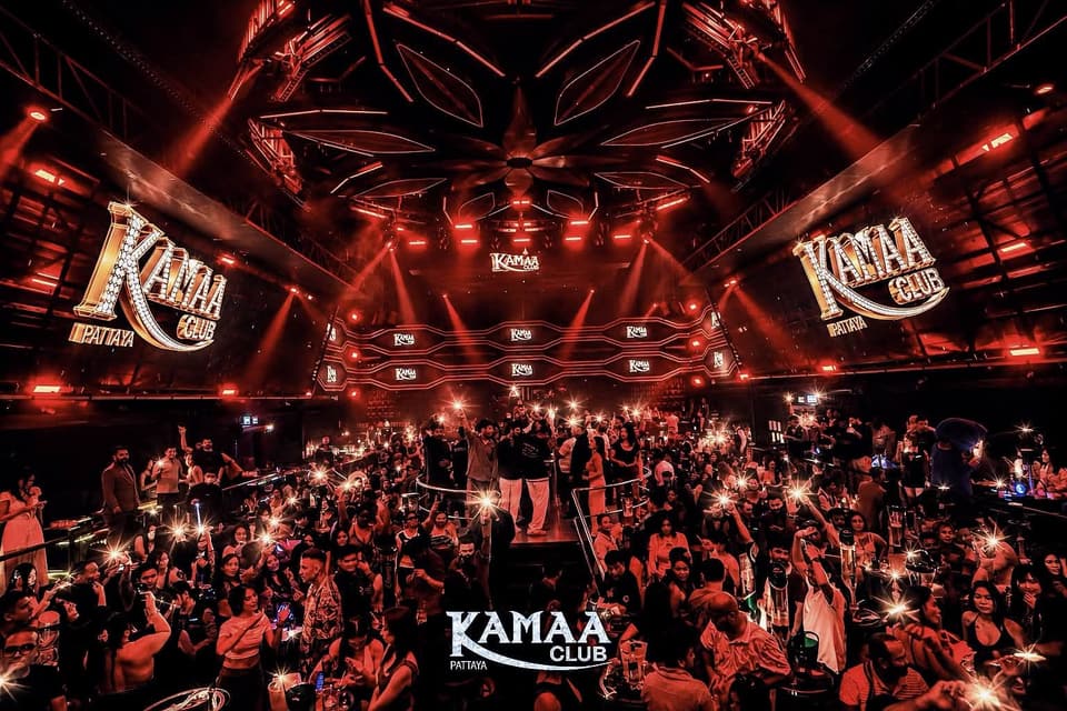 Red-lit main room with an ornate ceiling and a full crowd at Kamaa Club Pattaya